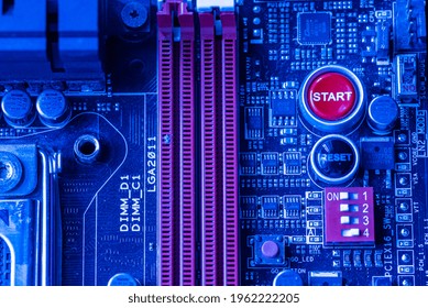 Deatil Of Start And Reset Button Inside A Pc In Blue Lght