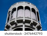 Debrecen Big Forest Nature Conservation Area. A water tower is an elevated structure supporting a water tank constructed at a height sufficient to pressurize a distribution system for potable water.