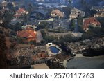 Debris litters the ground of a burnt house in the Pacific Palisades neighborhood, following powerful wind-driven wildfires that forced evacuations in Los Angeles, California.