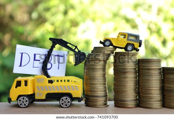 Debt car concept, construction truck help\
taking \