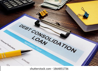 Debt consolidation loan form, notepad and calculator. - Shutterstock ID 1864851736