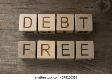 Debt Free Text On A Wooden Background