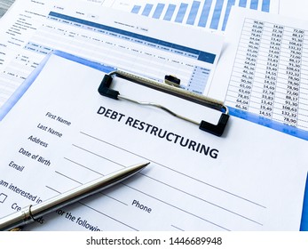 Debt restructuring document with graph on table.