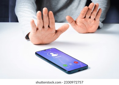 Debtor refusal to accept incoming call from creditor on smartphone. Financial or debt concept.
