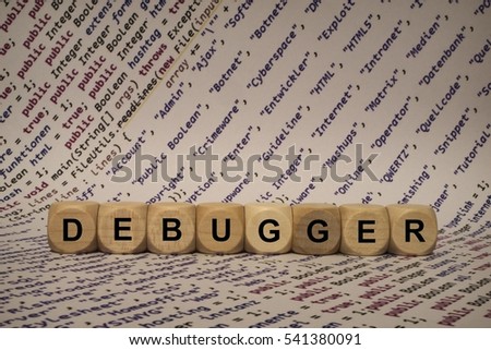 debugger - cube with letters and words from the computer, software, internet categories, wooden cubes
