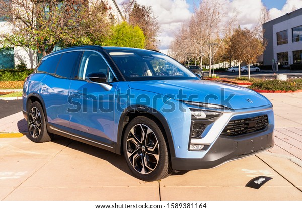 Dec 14, 2019 San Jose / CA / USA - NIO ES8\
electric SUV displayed in front of NIO headquarters; NIO is a\
Chinese automobile manufacturer specializing in developing electric\
autonomous vehicles