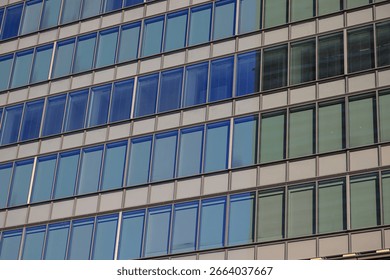 Dec 9 2024 patterns of a modern office building with reflective windows