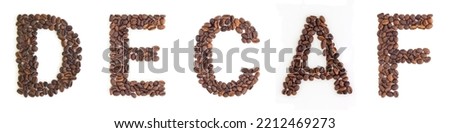 DECAF headline from roasted coffee beans on white background