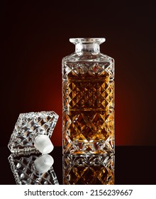 Decanter With Whiskey Or Cognac On A Black Background