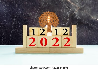December 12th, 12 December, Twelth of December - White block calendar on vintage table - Date on dark background.