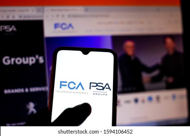December 19, 2019, Brazil. In this photo illustration the Fiat Chrysler Automobiles and Groupe PSA logo is displayed on a smartphone and opened websites on blurred background.