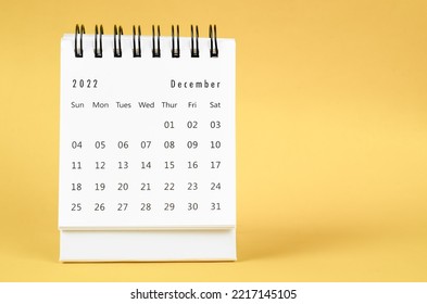 December 2022 Monthly desk calendar for 2022 year on yellow background. - Shutterstock ID 2217145105
