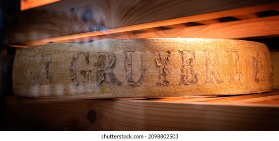 December 3 2021, Lyon, Rhone Alpes Auvergne, France : Swiss PDO Gruyère Wheel In A Ripening Cellar