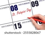 December 8. Hand writing text St. Patapius Day on calendar date. Save the date. Holiday. Day of the year concept.