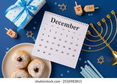 December calendar surrounded by Hanukkah symbols including a menorah, dreidels, donuts, and a gift. The scene captures the festive spirit and traditions of Hanukkah