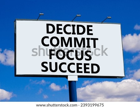 Decide commit focus succeed symbol. Concept word Decide Commit Focus Succeed on beautiful big billboard. Beautiful blue sky cloud background. Business decide commit focus succeed concept. Copy space.