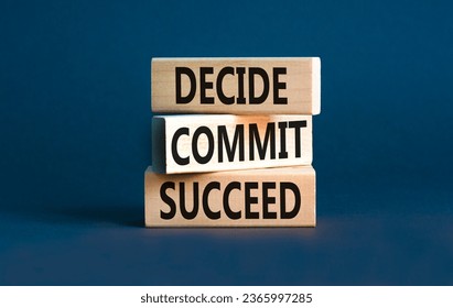 Decide commit succeed symbol. Concept word Decide Commit Succeed on beautiful wooden block. Beautiful grey table grey background. Business decide commit succeed concept. Copy space.