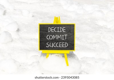 Decide commit succeed symbol. Concept word Decide Commit Succeed on beautiful black chalk blackboard. White snow. Beautiful white snow background. Business decide commit succeed concept. Copy space. - Shutterstock ID 2395043085