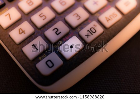 Decimal point key of a scientific calculator