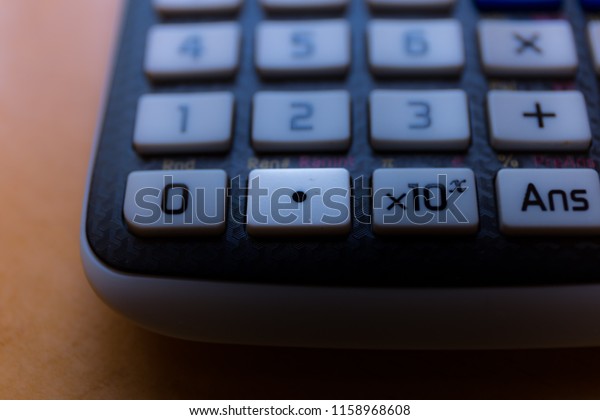 Decimal point key of\
a scientific calculator