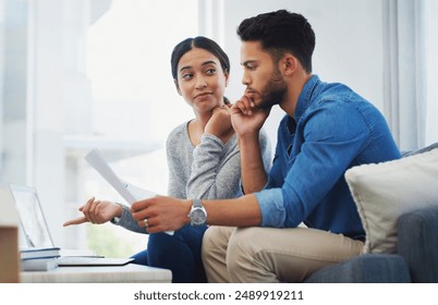 Decision, documents and laptop with couple on sofa in living room of home for bank payment. Documents, finance or thinking with man and woman in apartment to review insurance, mortgage on computer - Powered by Shutterstock