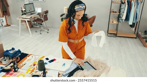 Decision, fabric and tablet with fashion designer woman in textile workshop for research. Clothing industry, material and textile with style director in office for manufacturing or production - Powered by Shutterstock