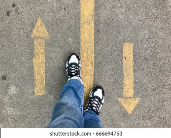 Decision For The Future, Man Standing With Forward Or Step Back Direction Arrow Choices.