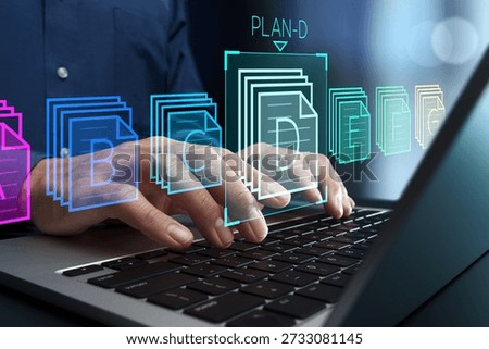 Decision making process and business plan development. Judgment and criteria. Manager choosing between alternatives on laptop computer.