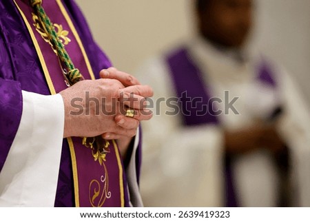 The decisive call for catechumens. This important Lenten ritual is for catechumens preparing for full initiation. Baptism, Confirmation, and First Communion.  Saint Julien en Genevois. France.