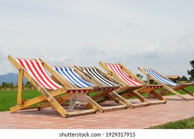 deck chairs with blue sky background
