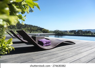 Deck Chairs By The Pool