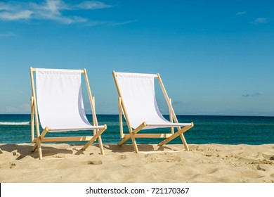 Deck Chairs On Beach 