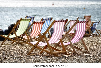 Deck Chairs On Brighton Beach, UK