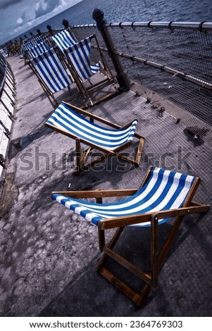 Deckchairs on the prom cornwall uk 