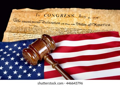 Declaration of Independence with American flag and wooden gavel. - Powered by Shutterstock