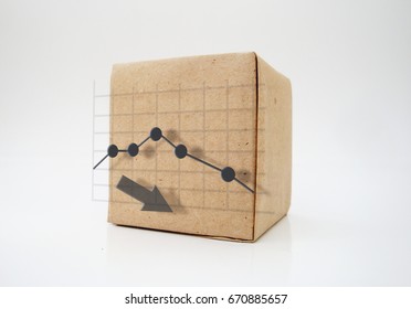 Declining graph. Printed on paper. On a wooden texture.