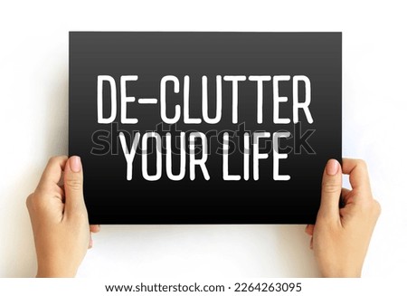 De-Clutter Your Life text on card, concept background