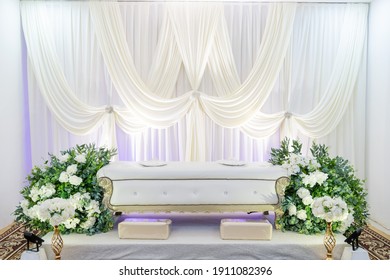 Deco with flower and The pelamin or wedding dais is specially created in a traditional Malay wedding.It is usually grandly designed and gaily decorated.