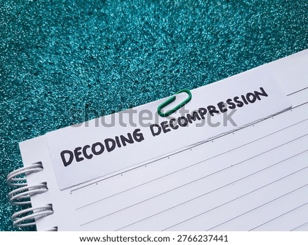 Decoding decompression writting on blue background. 
