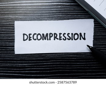 Decompression writting on table background.