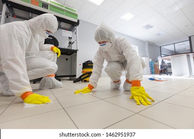 Decontamination of a room after an incident. Practical exercises during a training session on asbestos risk prevention, sample preparation room of an asbestos laboratory - Shutterstock ID 1462951937