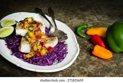 Decontructed Fish Tacos On A Bed Of Cabbage