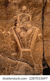 A decorated anthropomorphic warrior figure, part of the Dry Fork Canyon ancient Fremont petroglyphs located near the town of Vernal in northeastern Utah, United States.