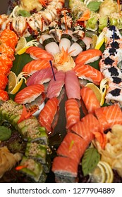 Decorated Catering Banquet Table With Different Sushi Rolls And Nigiri Sushi Plate Assortment On A Party