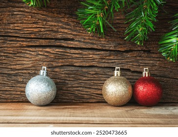 Decorated Christmas ornaments in silver, gold, and red on a rustic wooden surface, creating a warm and festive atmosphere perfect for celebrating the holiday season. - Powered by Shutterstock