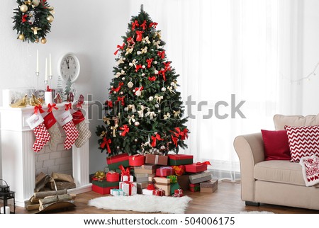 Decorated Christmas room with beautiful fir tree