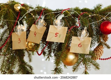 Decorated Christmas Tree Branch With Hanging Advent Calendar Made By Your Own Hands. High Quality Photo