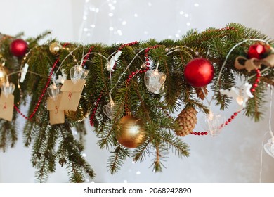 Decorated Christmas Tree Branch With Hanging Advent Calendar Made By Your Own Hands. High Quality Photo