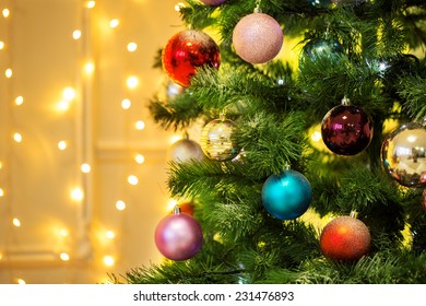 Decorated Christmas tree on blurred backgroun