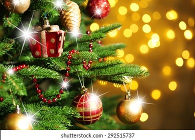 Decorated Christmas tree on lights background